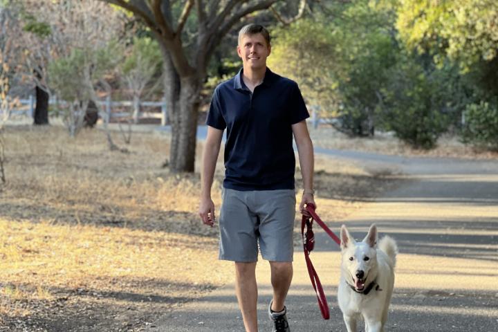 Matt Hill walking his dog