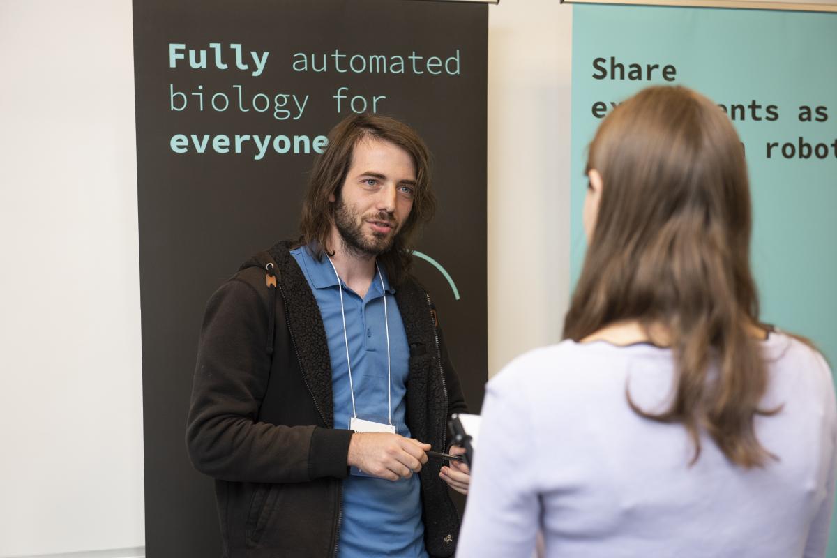 An employer talks with an Olin student during the Fall 2022 Career Fair on Olin's Needham, MA campus.