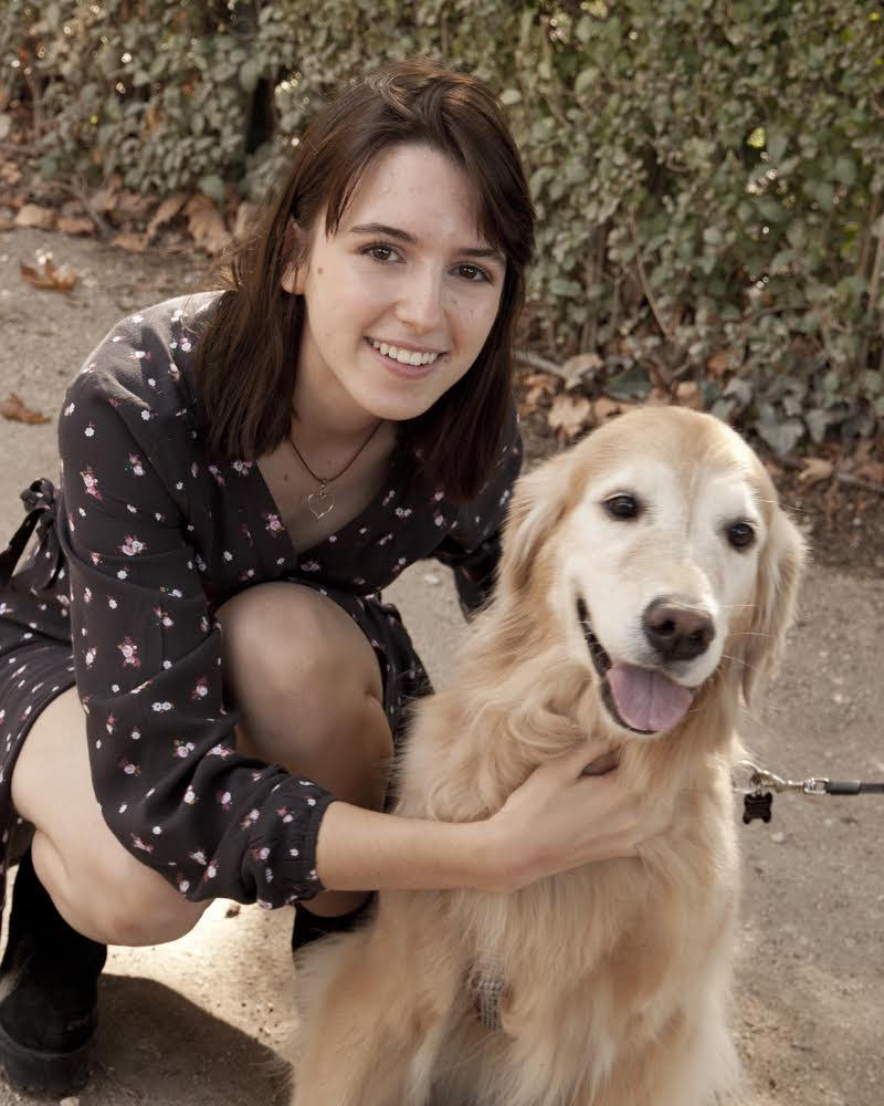 The author pictured with a dog.