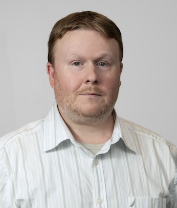 Adam P. Coulter, Associate Director of Digital Content