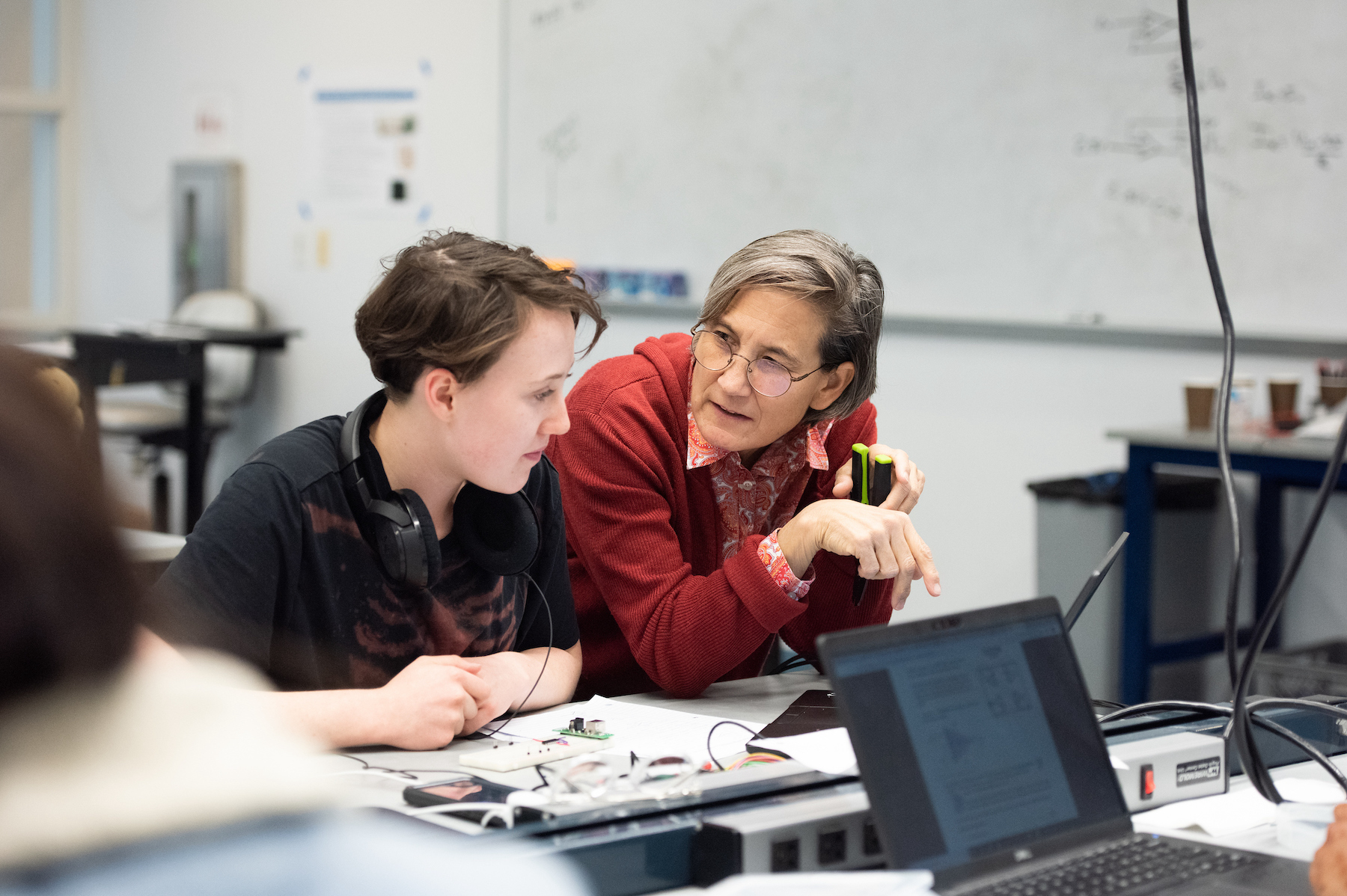 Linda Vanasupa, professor of materials engineering, talks with a student in 2019. Photo by Leise Jones.