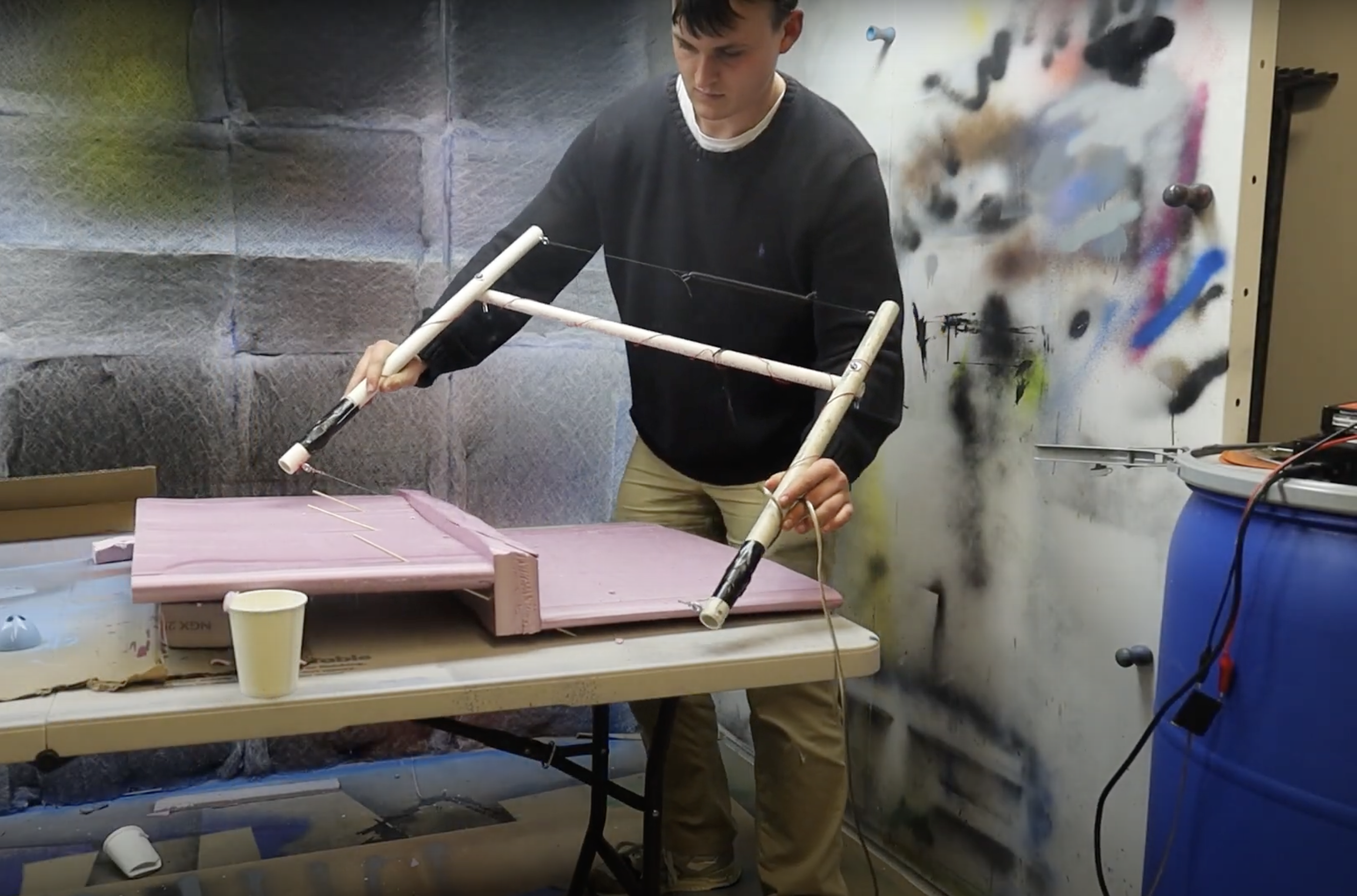 Alton working with hot wire to connect upper and lower airfoil profile.