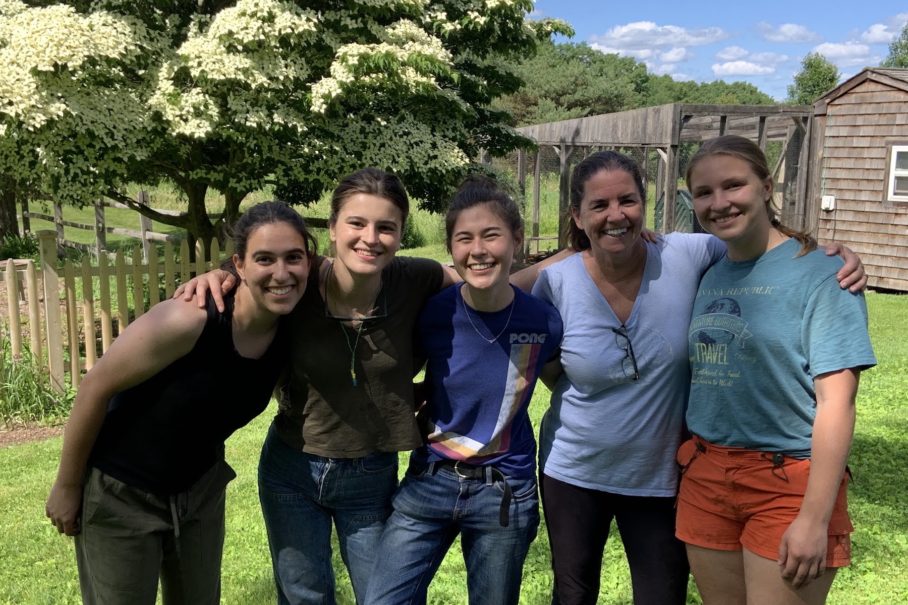 The Oliners pose at Woodland Farm with Sally Phelps, Olin's director of post-graduate planning.