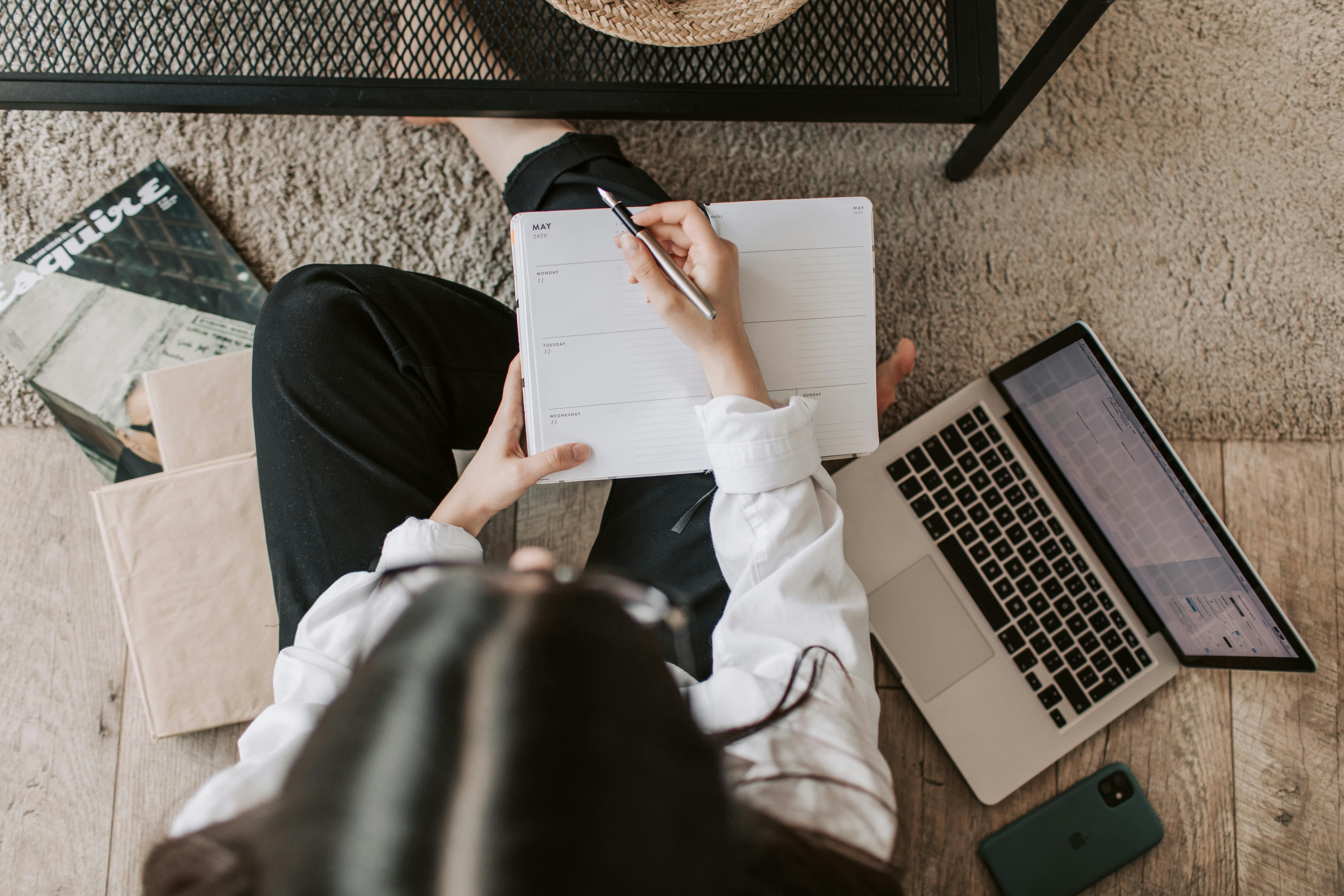 Student writing college essay on computer