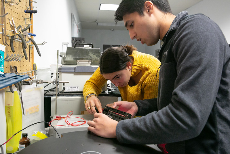 Two students working together in the Olin Shop.