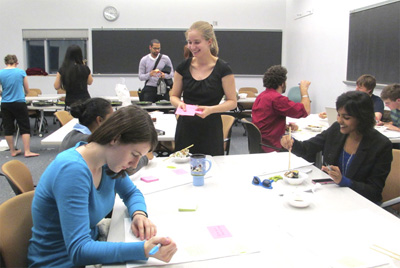 Team members working in a classroom