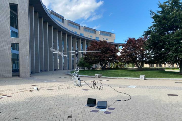 Olin College of Engineering students place antennae on campus to track the International Satellite Station (ISS) as it flew over on July 12, 2021.