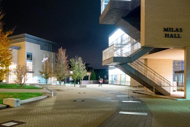 The Olin College campus at night A photo of two concrete buildings light up against the night sky