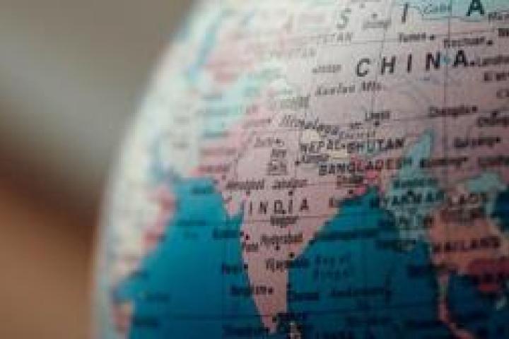 Closeup of a globe showing India and China
