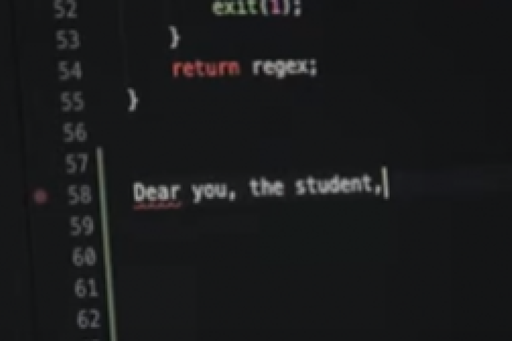 A computer screen with "Dear you, the student," typed on it.