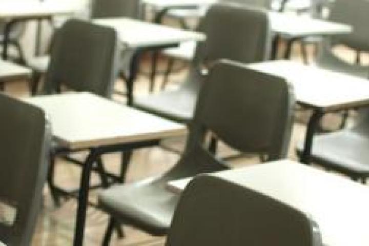 Empty school desks in rows