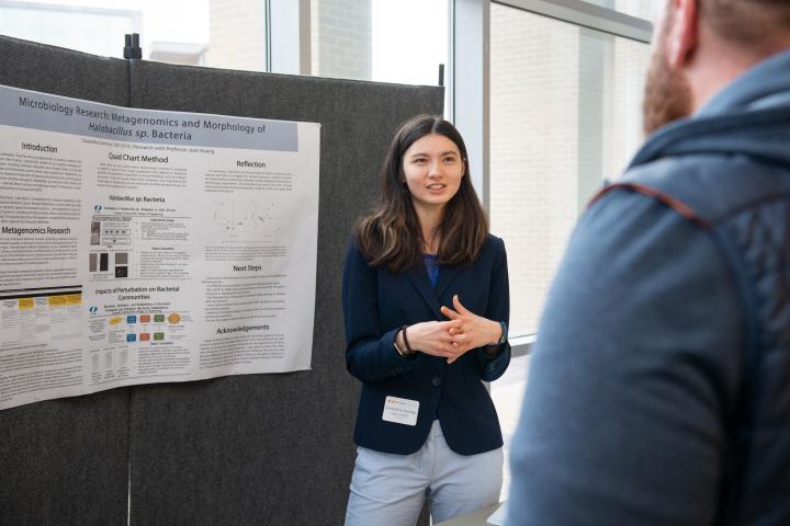 Cassandra Overney '21 speaks with the community during Fall EXPO 2018.