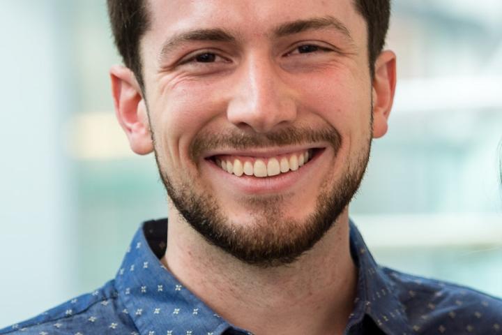 A photo of a young man smiling