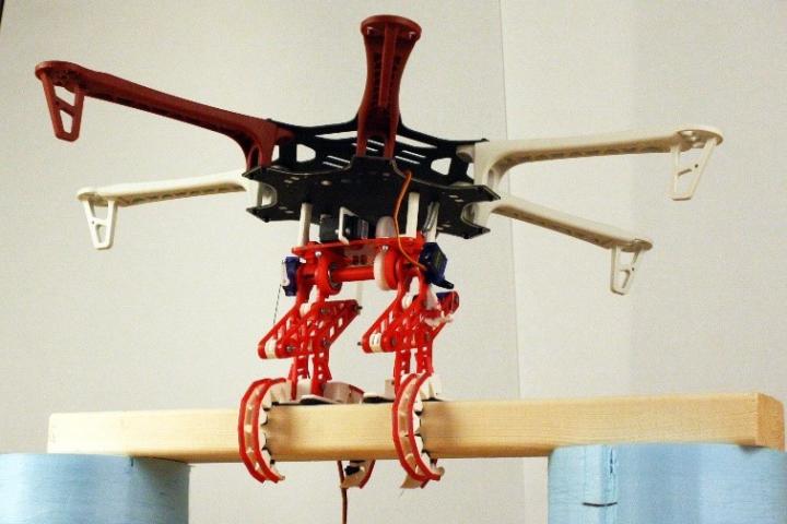 A photo of a four armed propeller looking machine