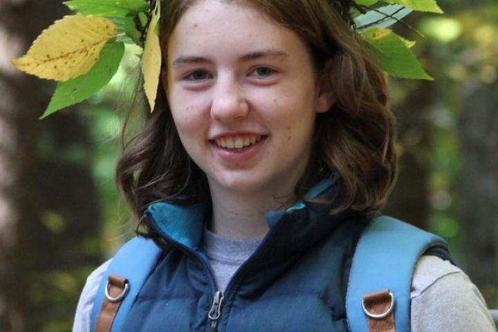 Olin College Admission Ambassador Arla Sutton A photo of a young woman wearing a crown of leaves on her head