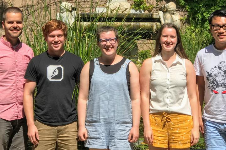 Gretchen Rice '20 and colleagues pose for a photo