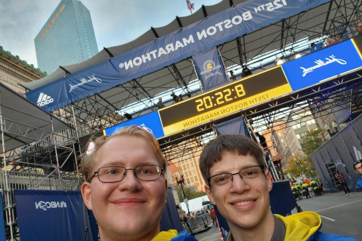 Zach Sherman '23 and Phillip Post '25 pose at the 125th Boston Marathon.