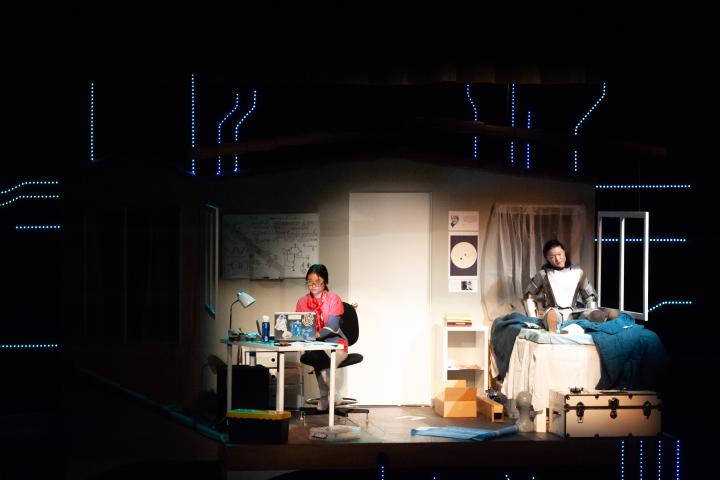 Scenes from a Theater production at Babson College A photo of two actors on stage as part of a theater production