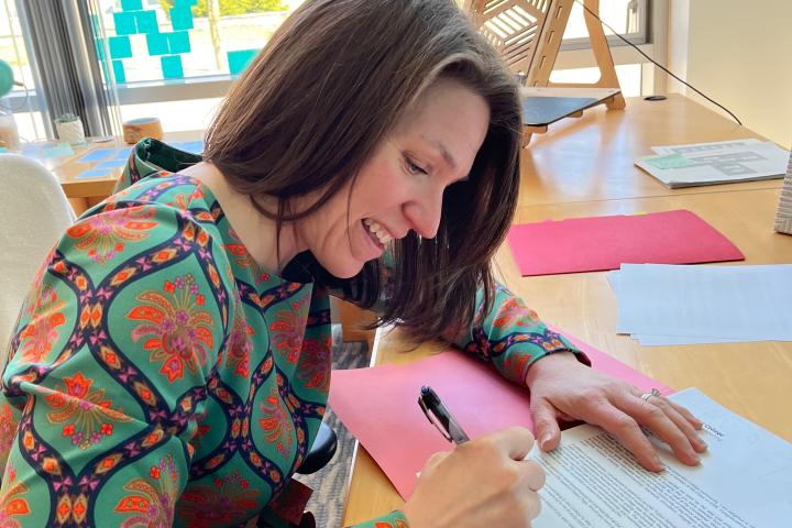 Emily signing decision letters