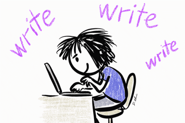 Student typing on a computer 