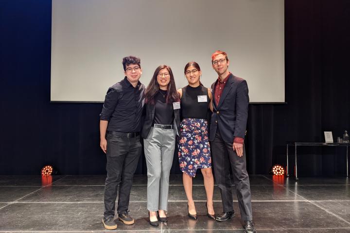 Pérez ’24, Sydney Chung ’24, Jen Sundstrom ’24, and Grant Goodall ’24 posing on stage