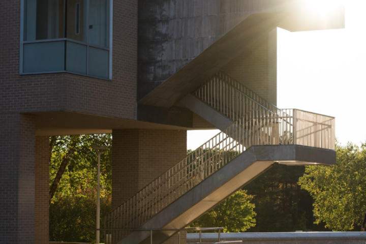 sun reflecting off of milas hall zoomed in on northern most stairwell