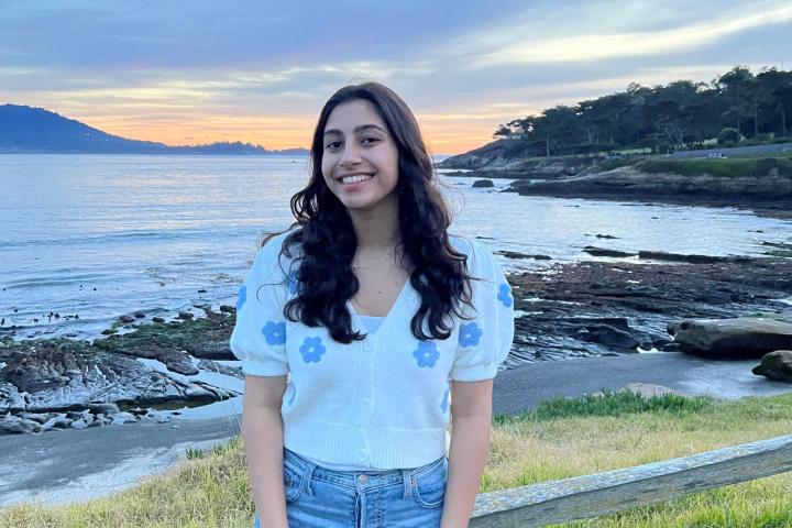 Prisha Bhatia headshot Prisha Bhatia headshot in front of sea