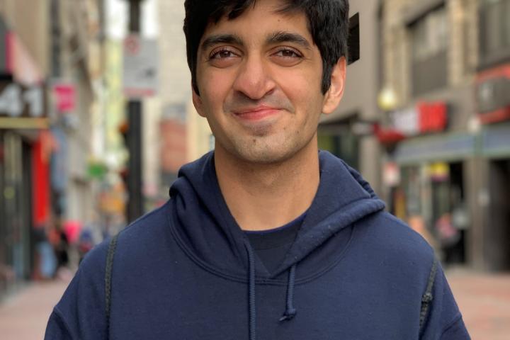 Vedanta Headshot wearing Olin Hoodie Vedanta Headshot wearing Olin Hoodie