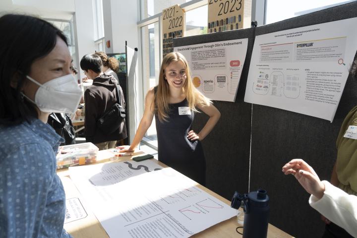 Olin senior Ally Bell '24 is pictured while presenting her project during Spring Expo 2024.
