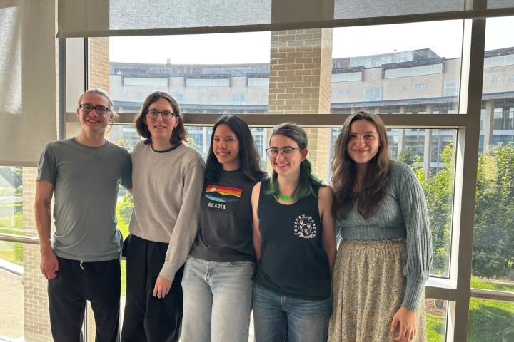 Moderna SCOPE Team 2024 Five students against a window backdrop