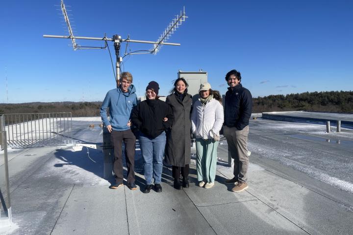 Linevision2024 five students outside near an antennae
