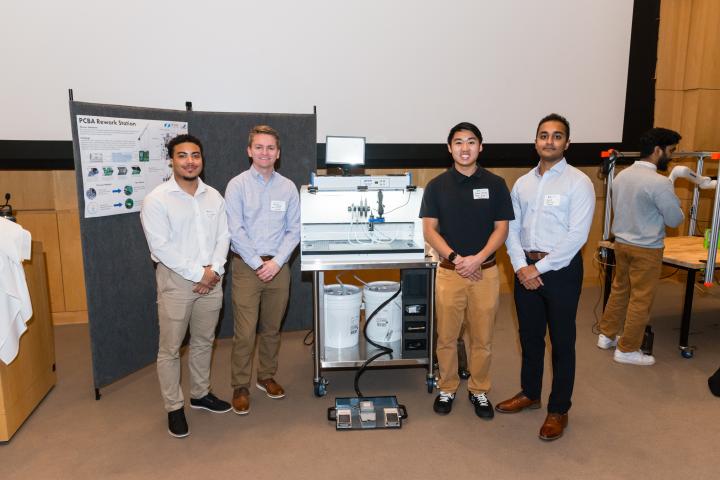 Blue Origin SCOPE Team 2024 Summit Students posing in front of project poster and finished project at Summit