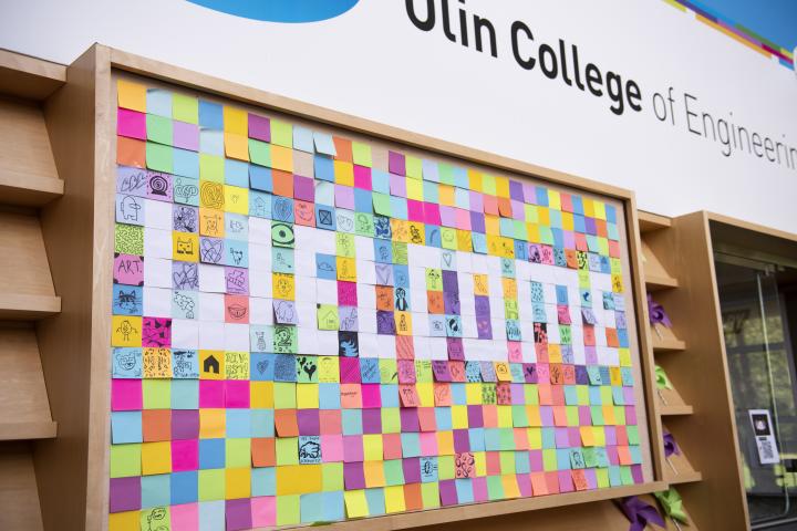 "Welcome" spelled out in sticky notes