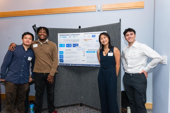 Pfizer SCOPE Team 2024 Summit Students posing in front of project poster at Summit