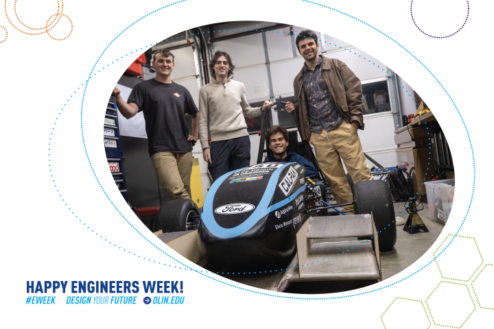 Four students gather around a Formula Car at Olin College.