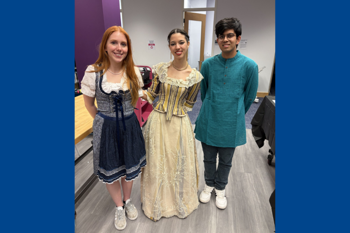 Three students pose for a photo at the Olin College Multicultural Fair in February 2025.