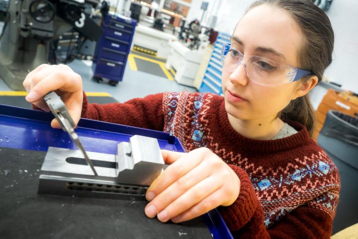 Pauline Petersen '26 working in the Olin Shop