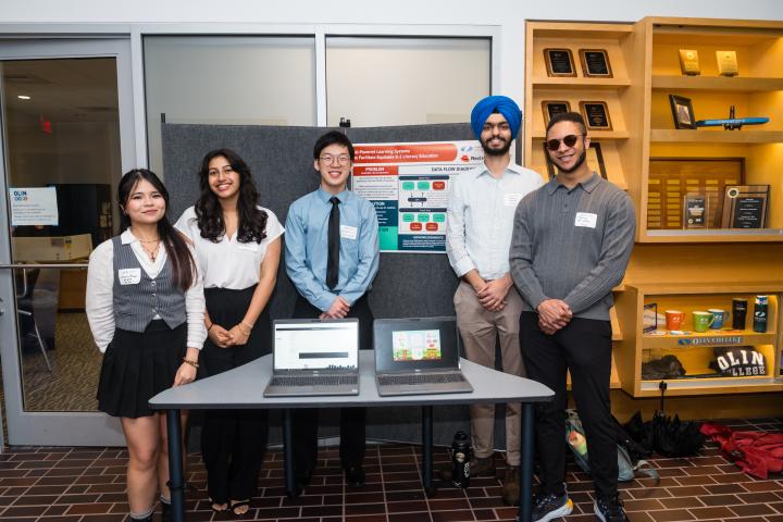 BU WISE SCOPE team Summit 2025 Students posing in front of project poster at Summit
