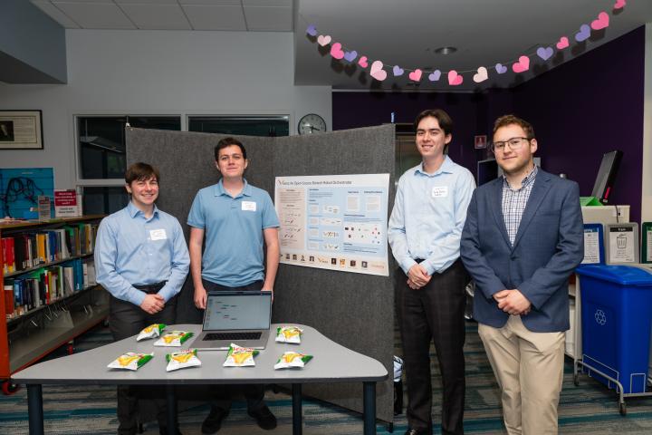 Moderna SCOPE Team at Summit 2025 Students posing in front of project poster at Summit