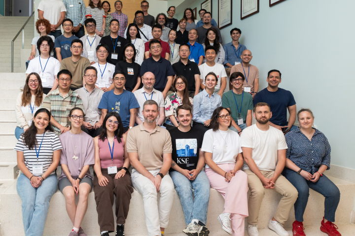 A group of people sitting on large steps