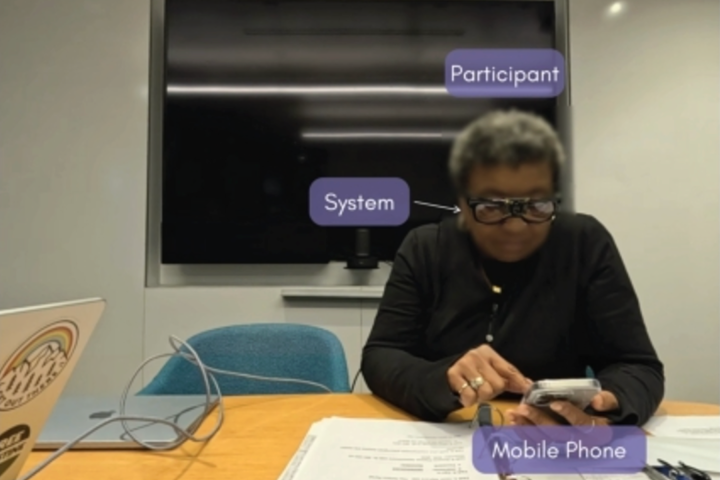A participant in the ACROSS Center's multimodal AI assistant project completes tasks for an in-person feasibility study.