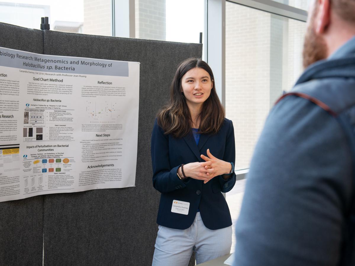 Cassandra Overney '21 speaks with the community during Fall EXPO 2018.