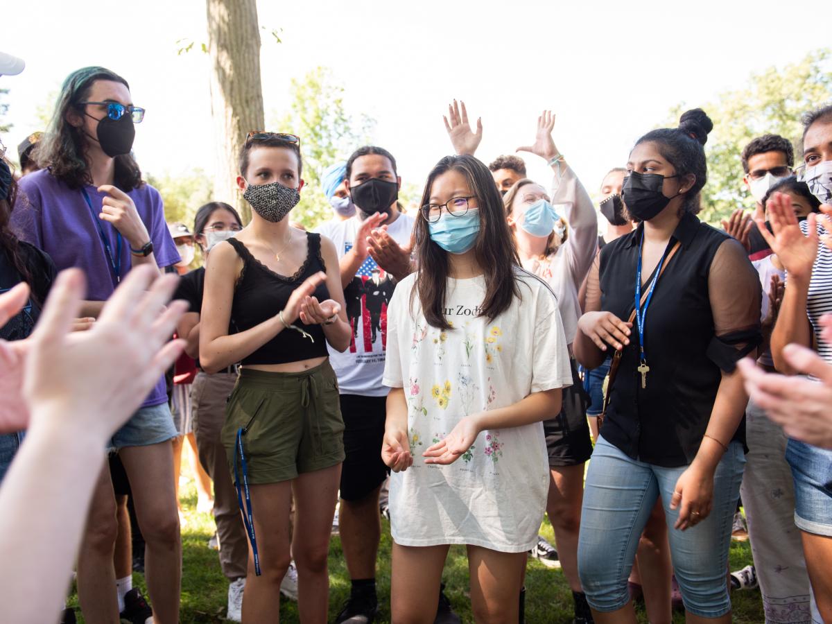 A photo of a group of first year students standing in a semi circle