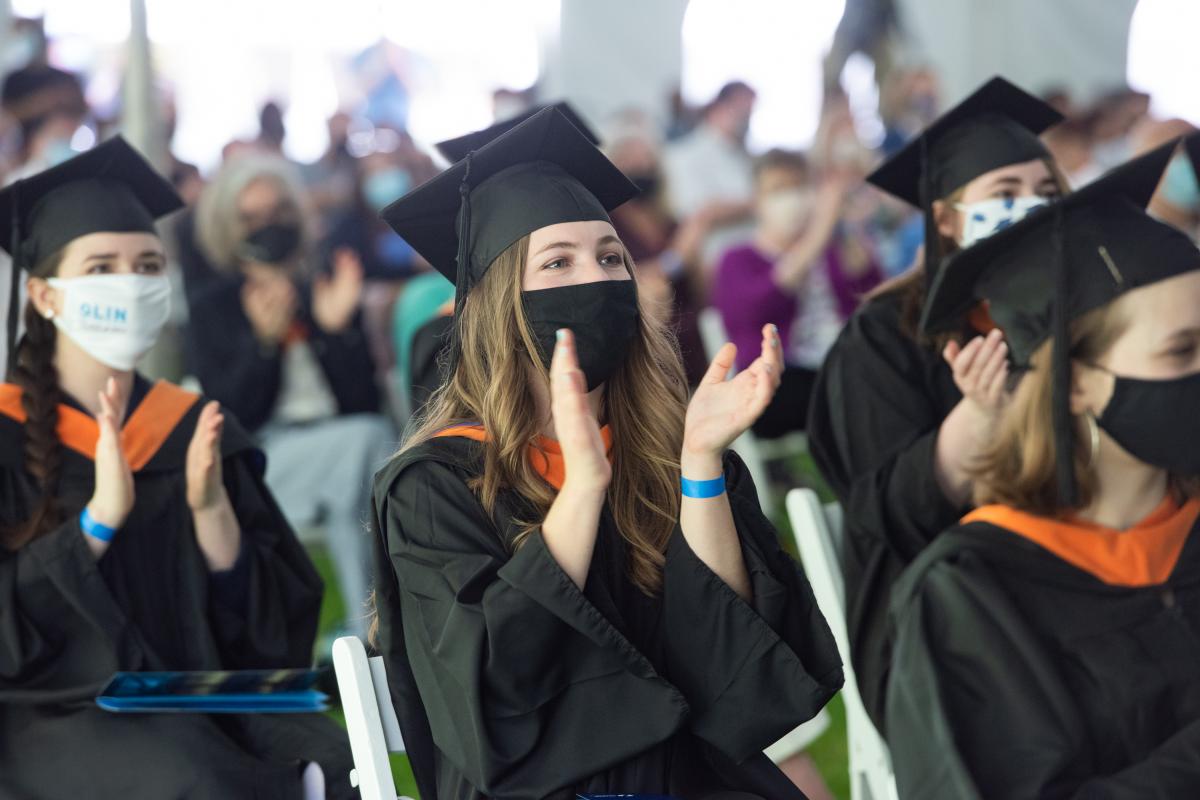 Graduates clapping at the 2021 Commencement ceremony