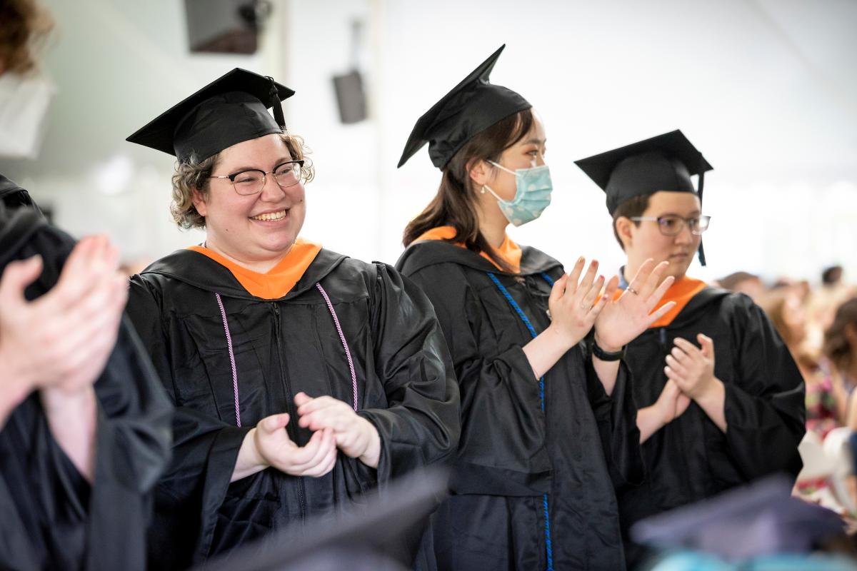 Olin College Class of 2022 graduates clap during the Commencement Ceremony on May 15, 2022.