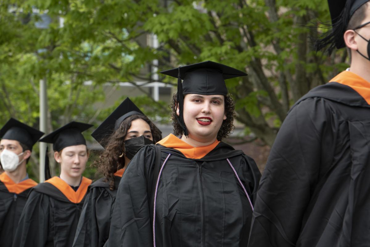 Members of the Class of 2022 line up to process down to the Commencement tent on May 15, 2022.