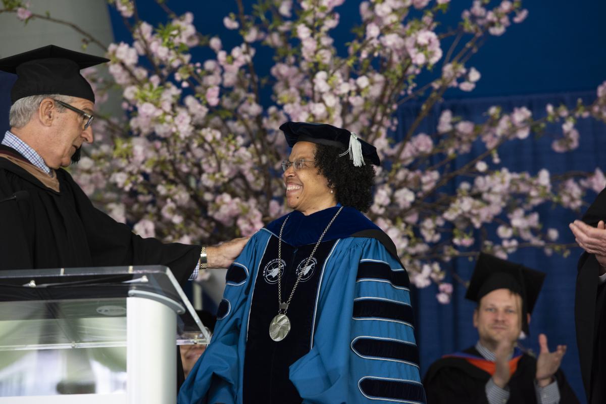 Former board Chair Ken Stokes P’12 presides over the Investiture Ceremony.