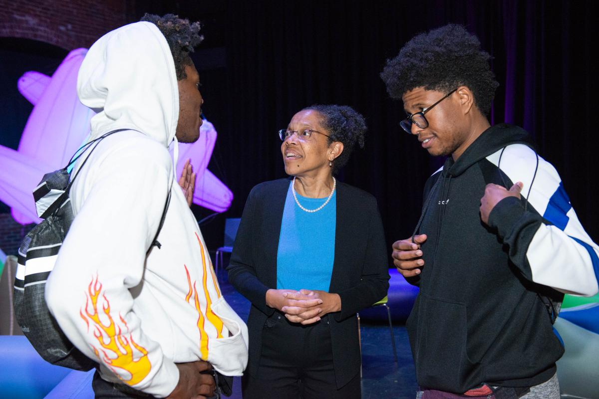 President Barabino talking to students at STEM Slam