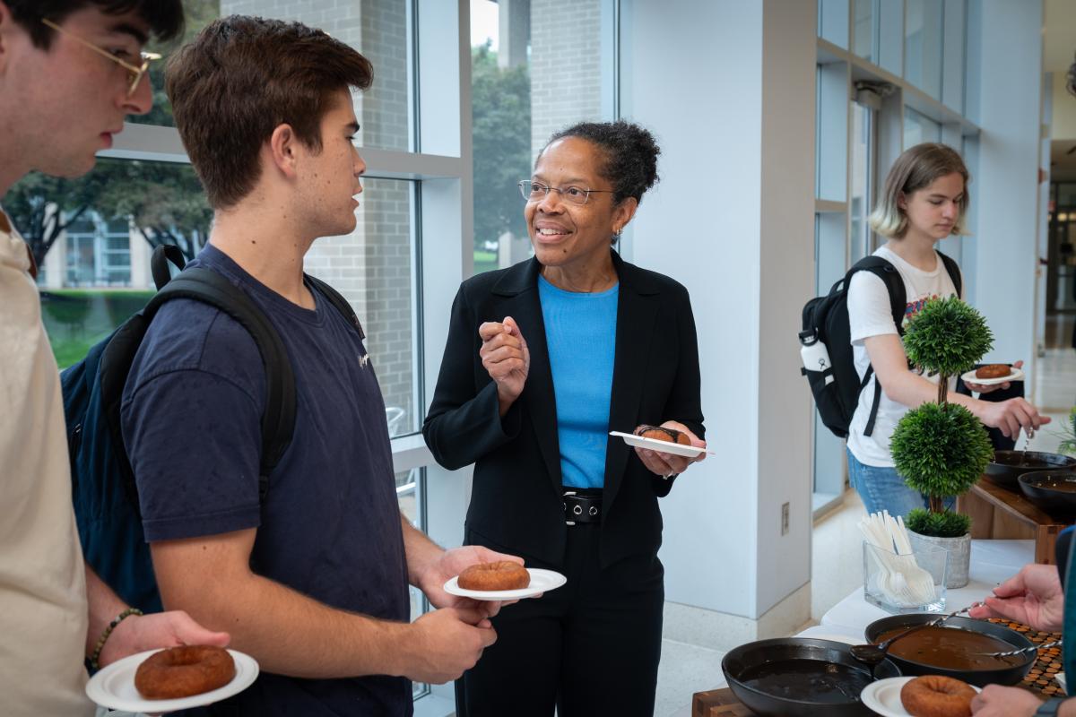 Olin President Gilda Barabino talks with a student during a "Donuts with Gilda" event on campus. Olin President Gilda Barabino talks with a student during a "Donuts with Gilda" event on campus.