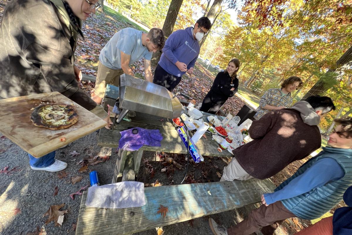 Pizza-making team bonding